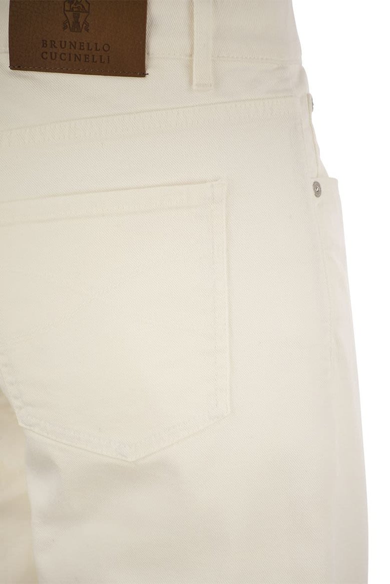 five-pocket traditional fit trousers in light comfort-dyed denim by Selfnex