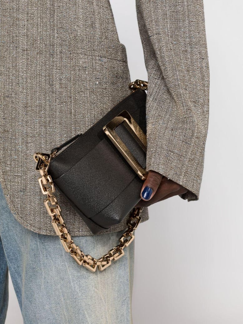 buckle pouchette epsom leather handbag by Selfnex