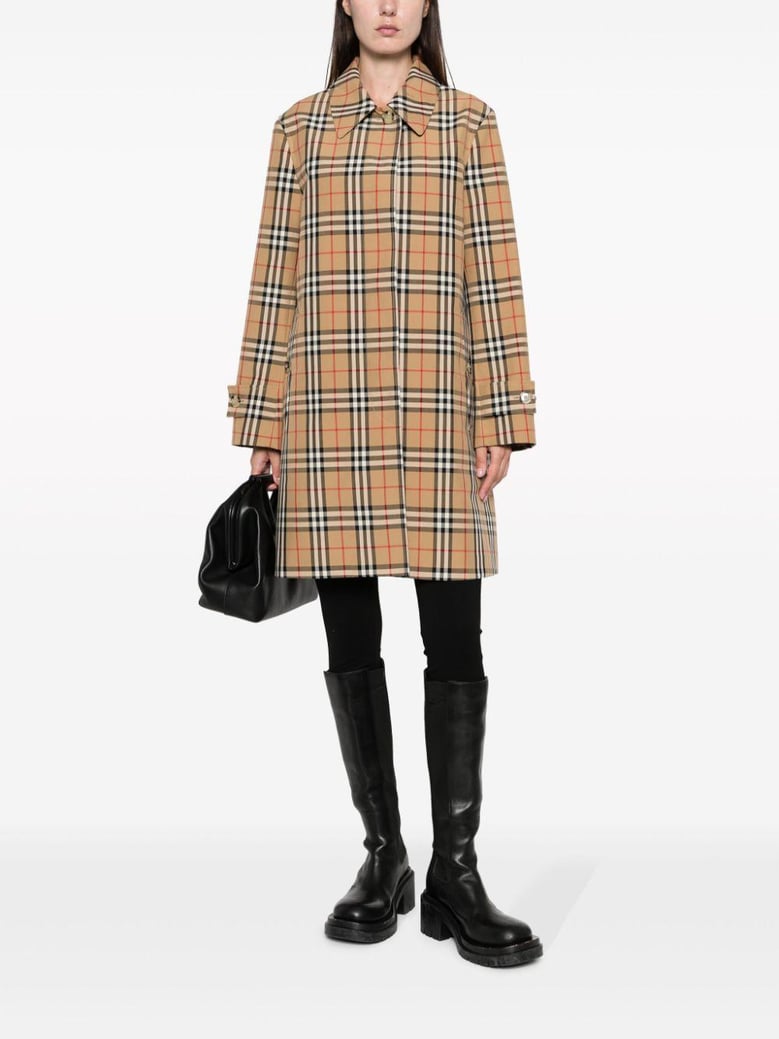 check motif raincoat by Selfnex