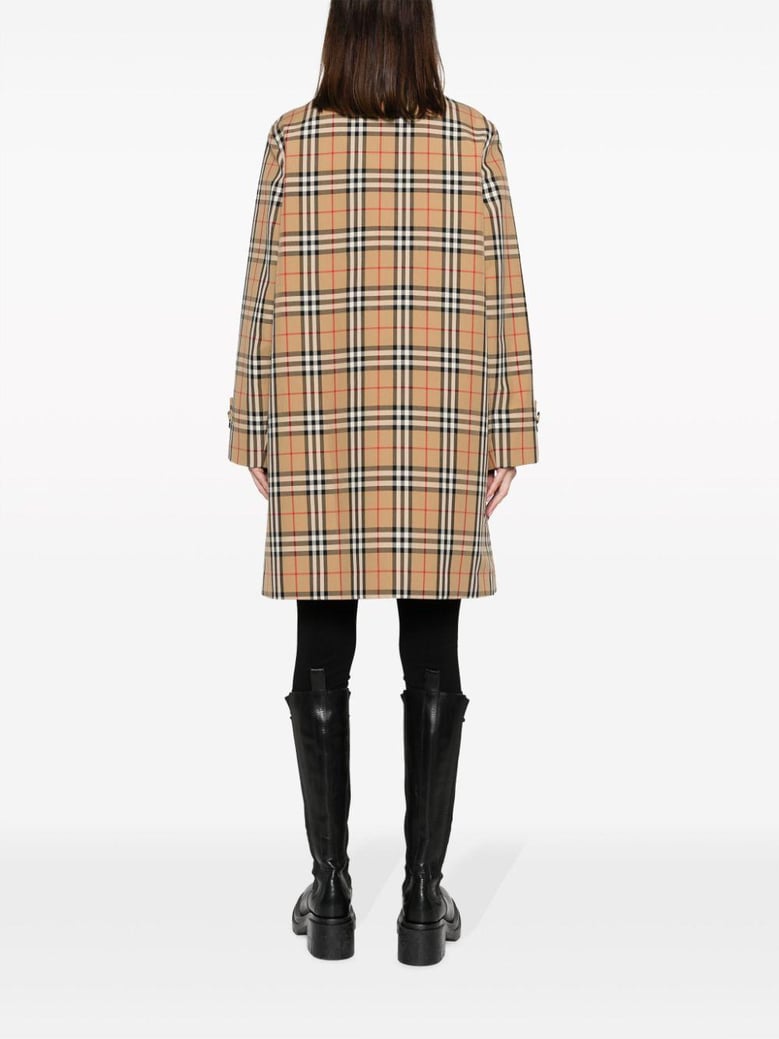 check motif raincoat by Selfnex
