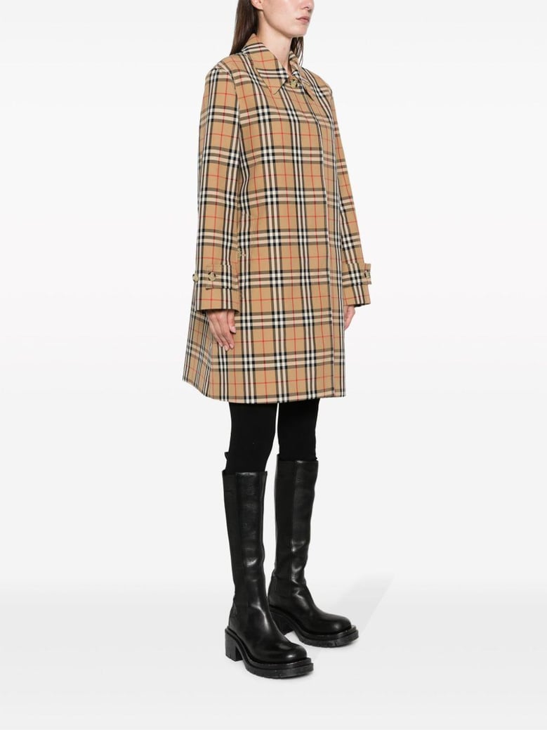 check motif raincoat by Selfnex
