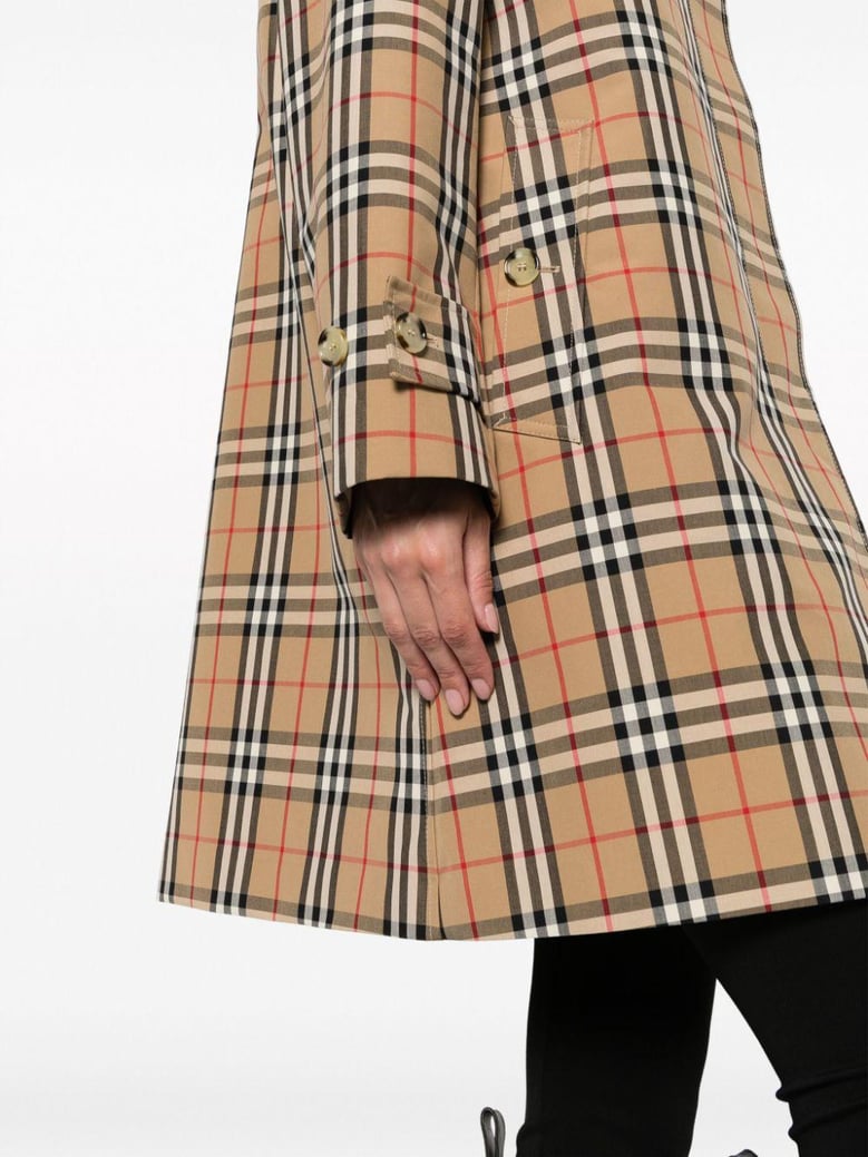 check motif raincoat by Selfnex