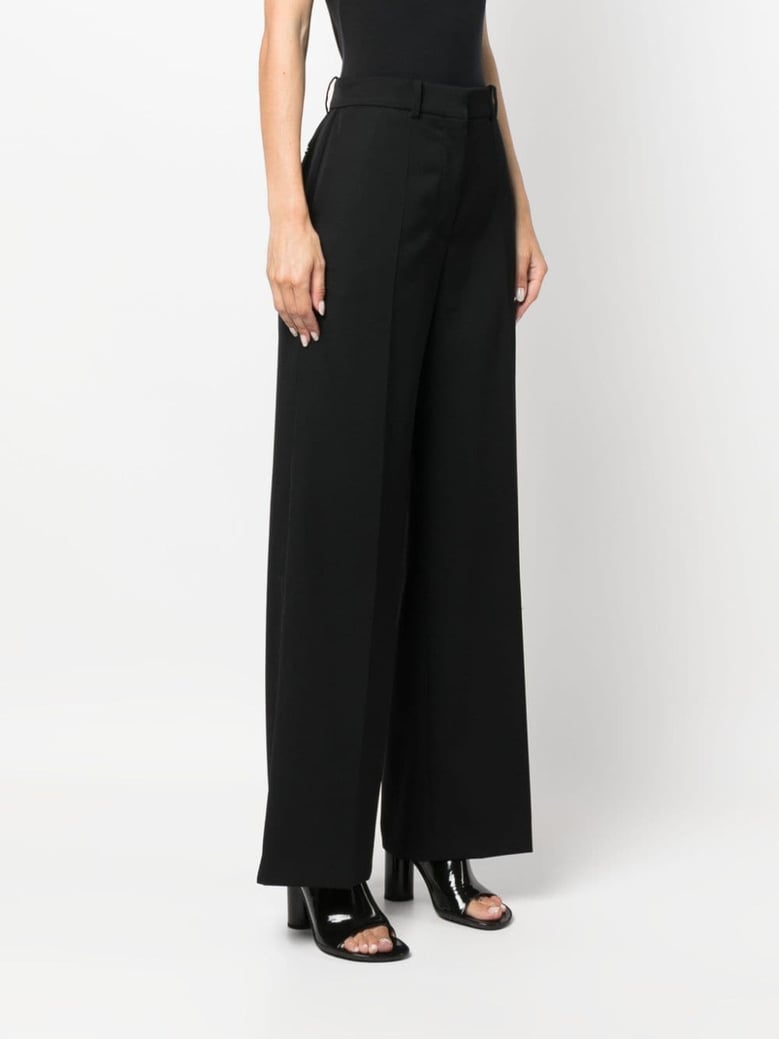 wide leg wool trousers by Selfnex