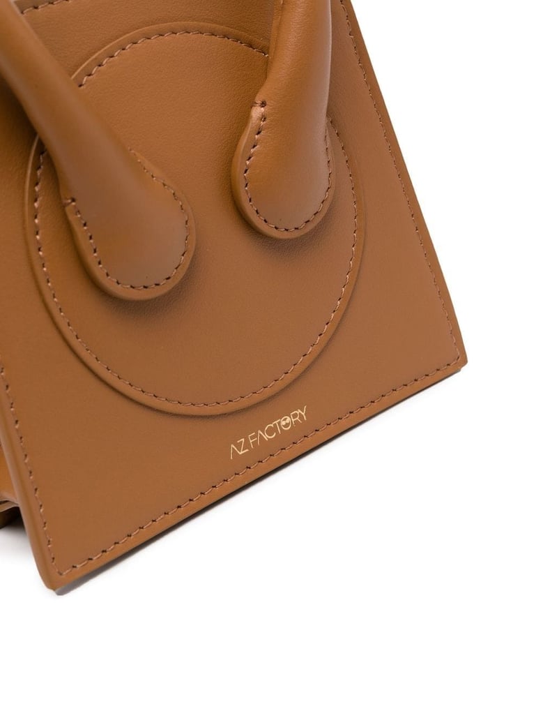 leather micro crossbody bag by Selfnex