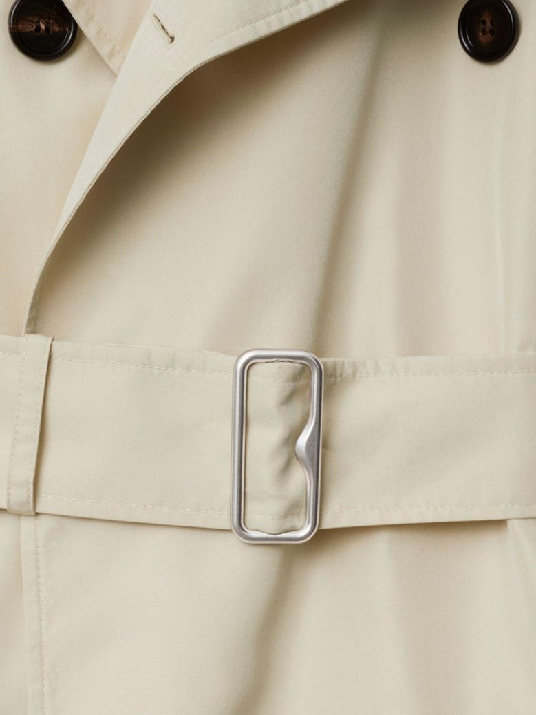 double-breasted button fastening belted coat by Selfnex