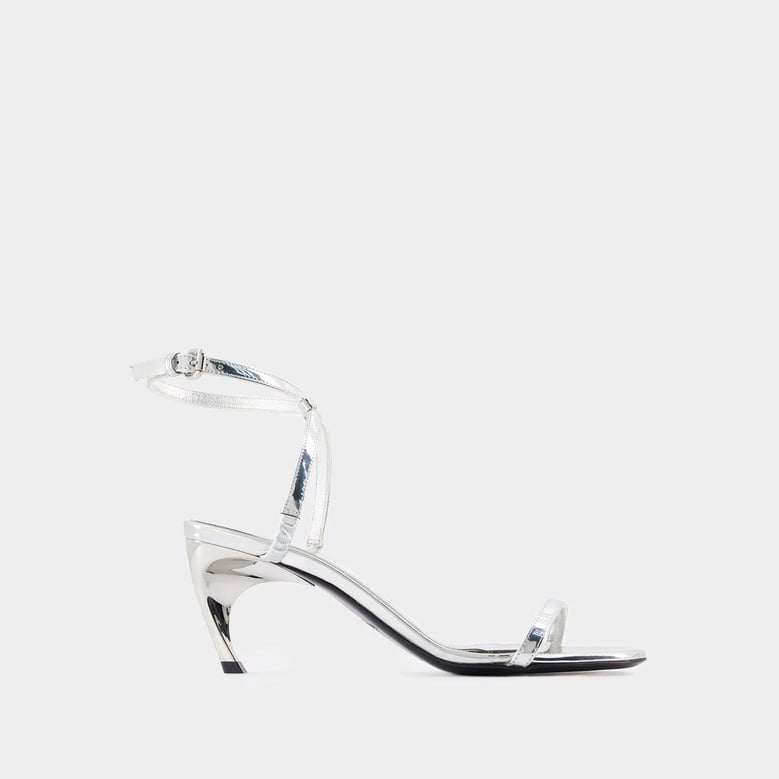 seal heeled sandals by Selfnex