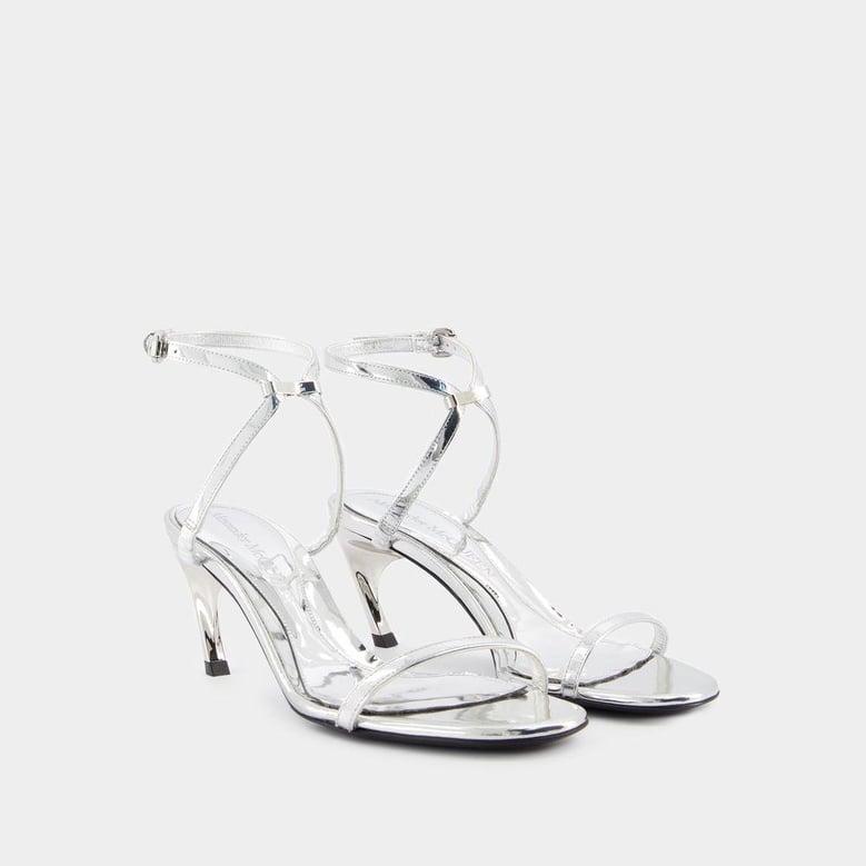 seal heeled sandals by Selfnex