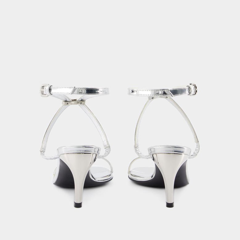 seal heeled sandals by Selfnex