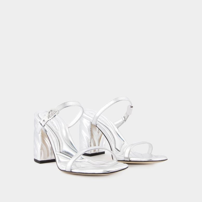 seal heeled sandals by Selfnex
