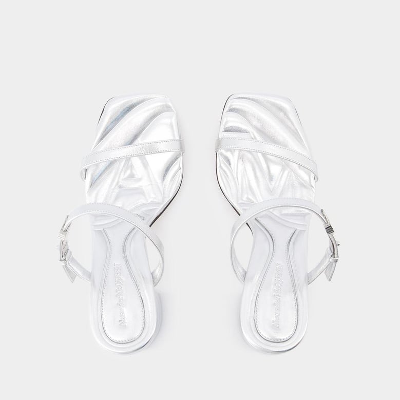 seal heeled sandals by Selfnex