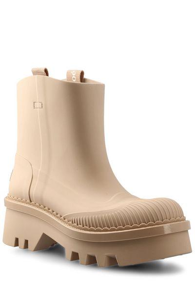 raina rubber boots by Selfnex