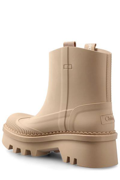 raina rubber boots by Selfnex
