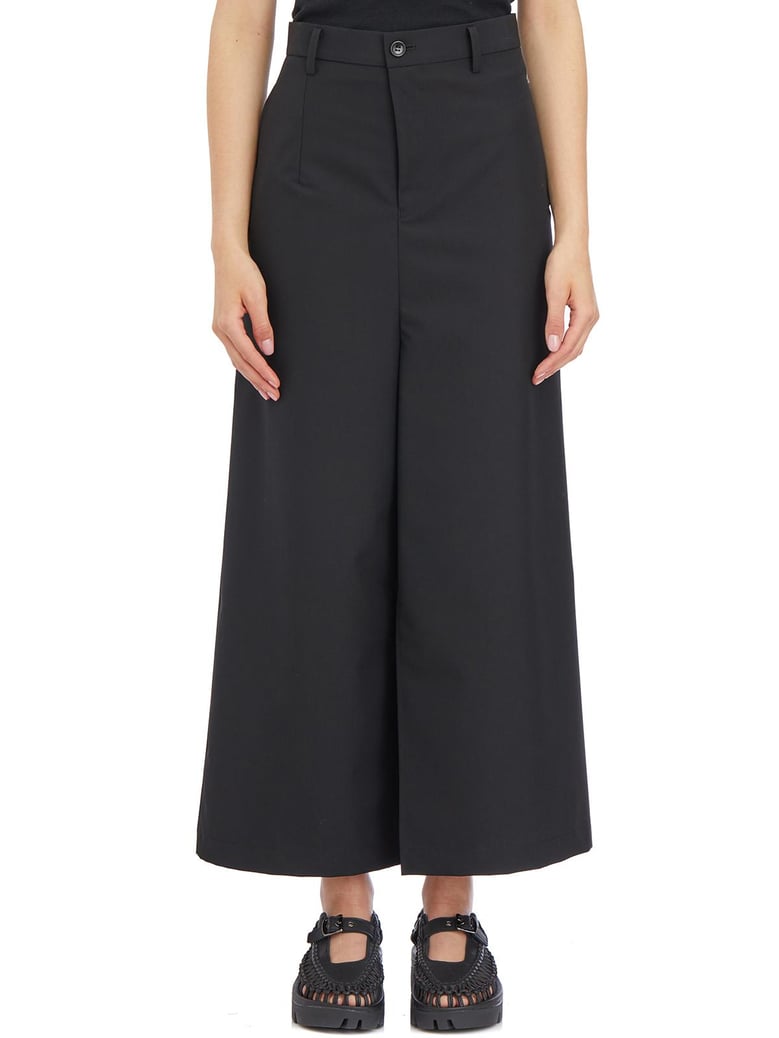 wool asymmetric trousers by Selfnex