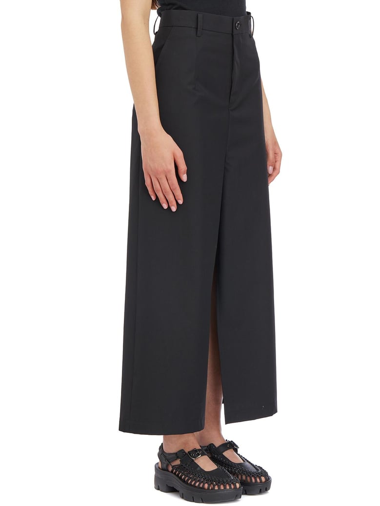 wool asymmetric trousers by Selfnex