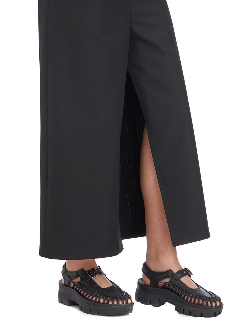 wool asymmetric trousers by Selfnex