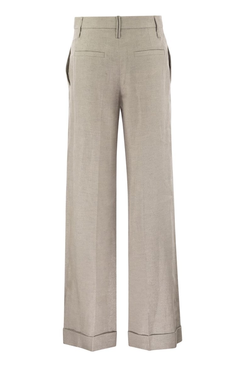 flared loose-fitting trousers in sparkling linen twill with necklace by Selfnex