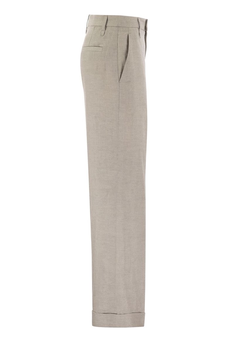 flared loose-fitting trousers in sparkling linen twill with necklace by Selfnex
