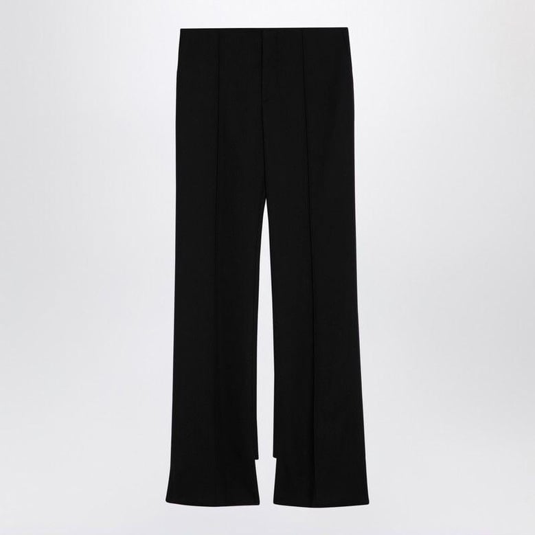 black asymmetrical wool trousers by Selfnex