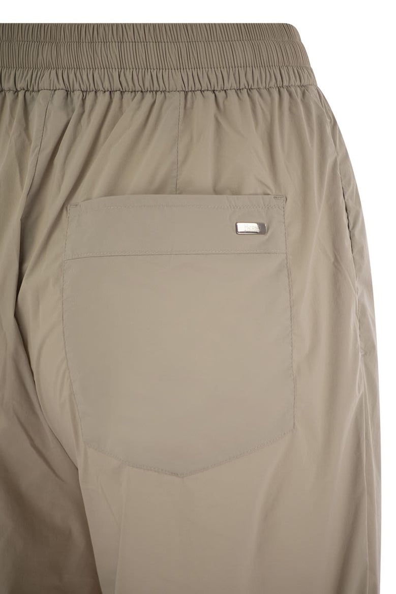 stretch nylon trousers by Selfnex