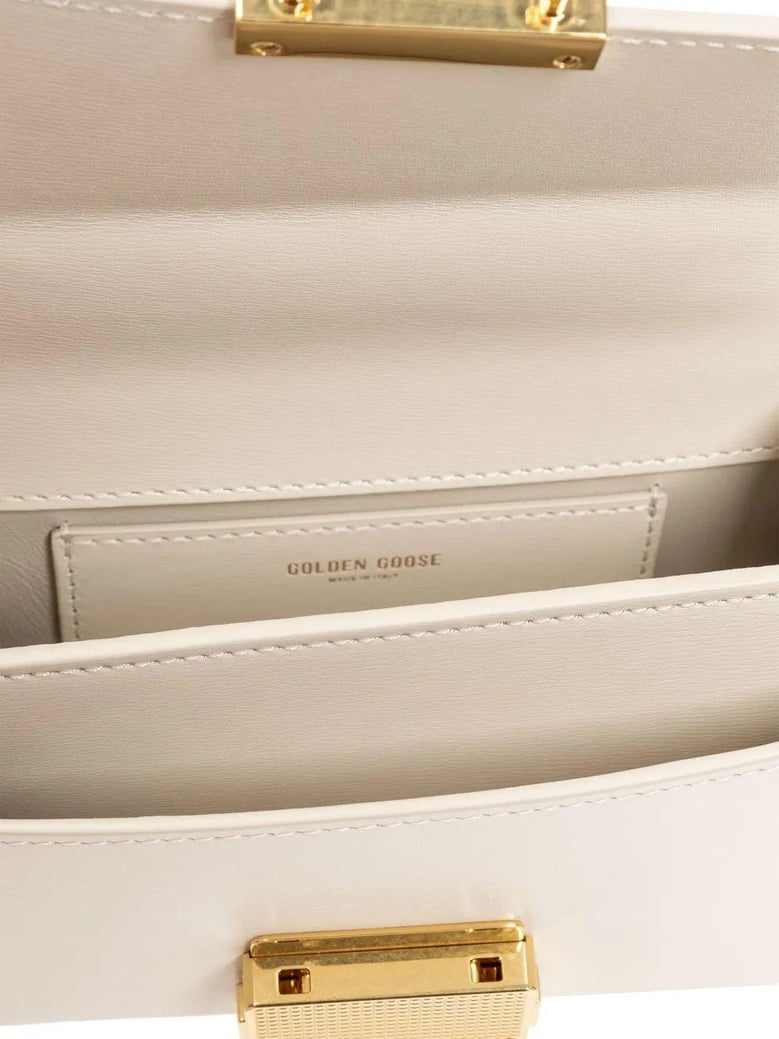 women white leather bag by Selfnex