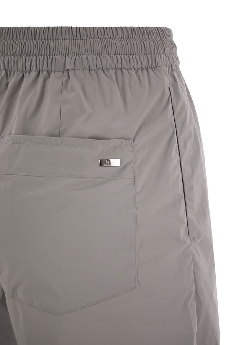 stretch nylon trousers by Selfnex