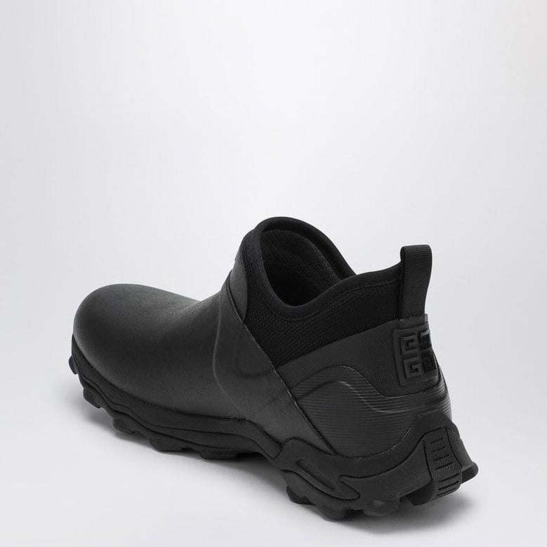 black rubber slip ons by Selfnex