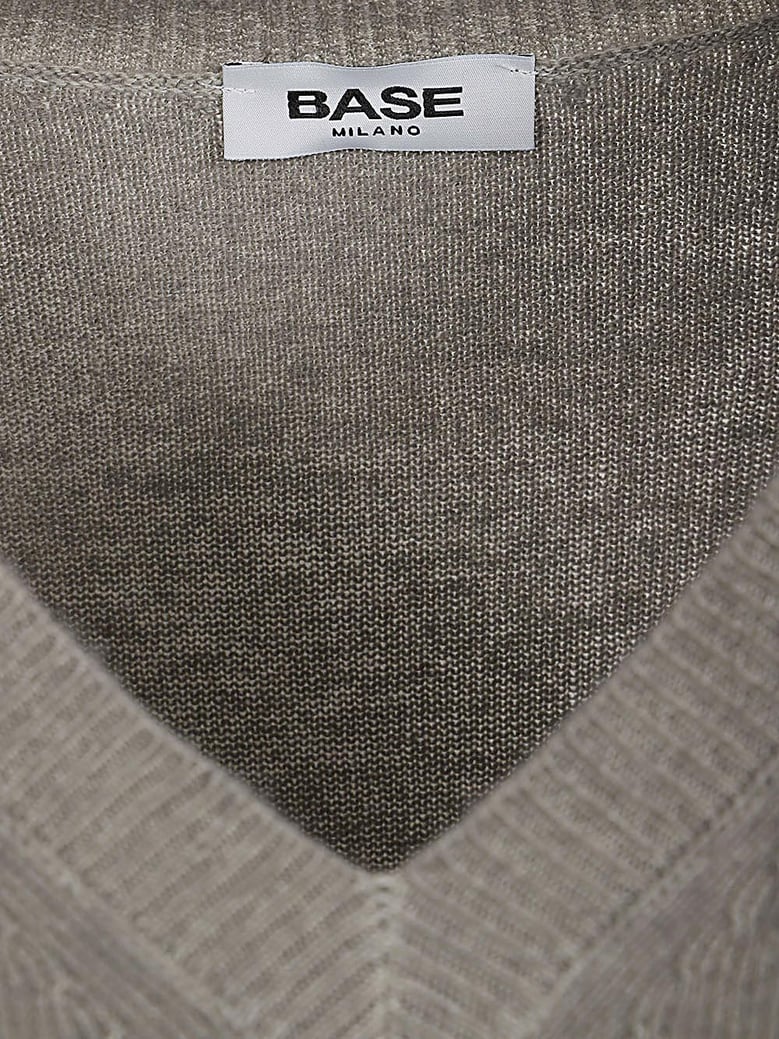 wool v-necked sweater by Selfnex