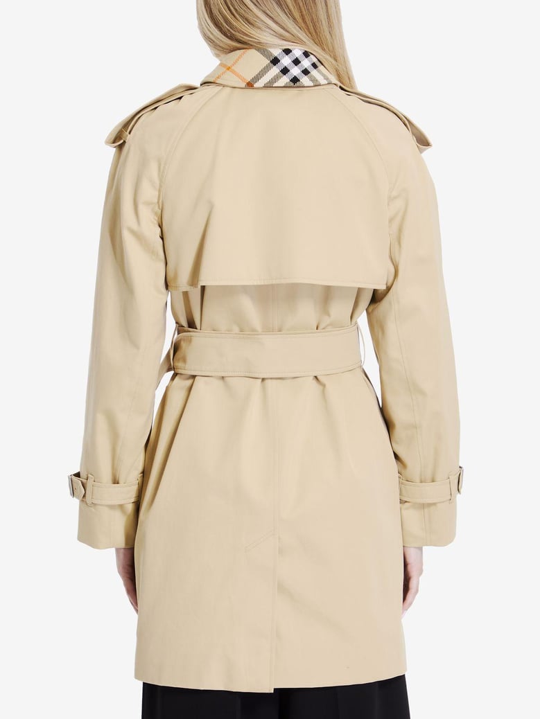 double-breasted button fastening belted coat by Selfnex