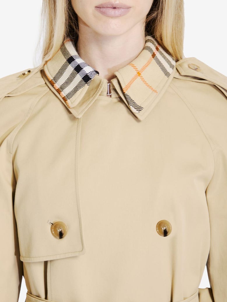 double-breasted button fastening belted coat by Selfnex