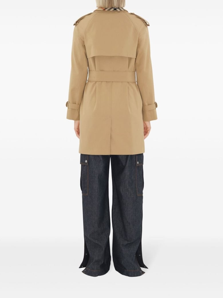 double-breasted button fastening belted coat by Selfnex