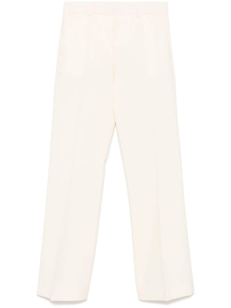 wool flared trousers by Selfnex