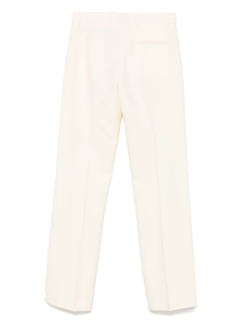 wool flared trousers by Selfnex
