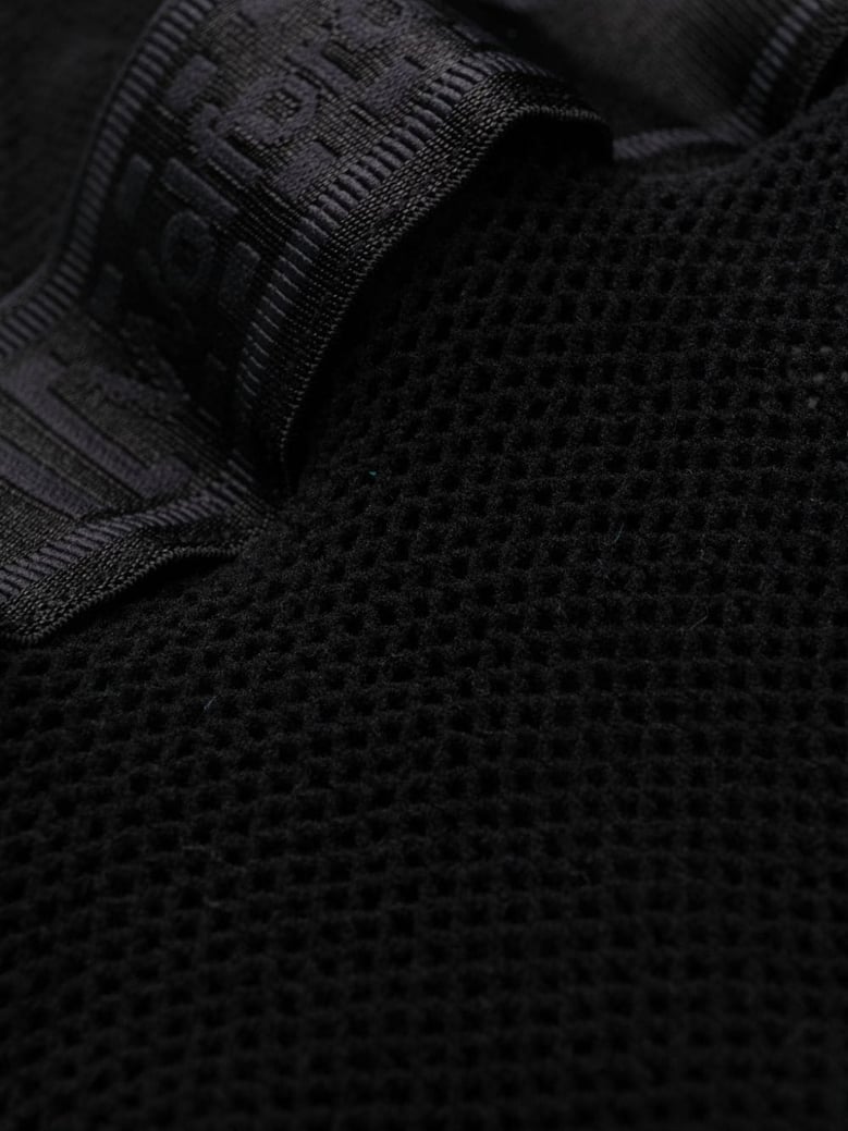 fishnet semi-sheer tights by Selfnex