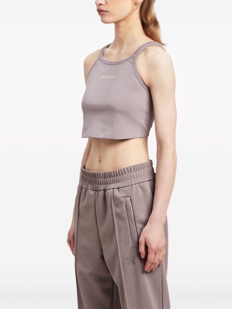 purple/white sleeveless logo crop top by Selfnex