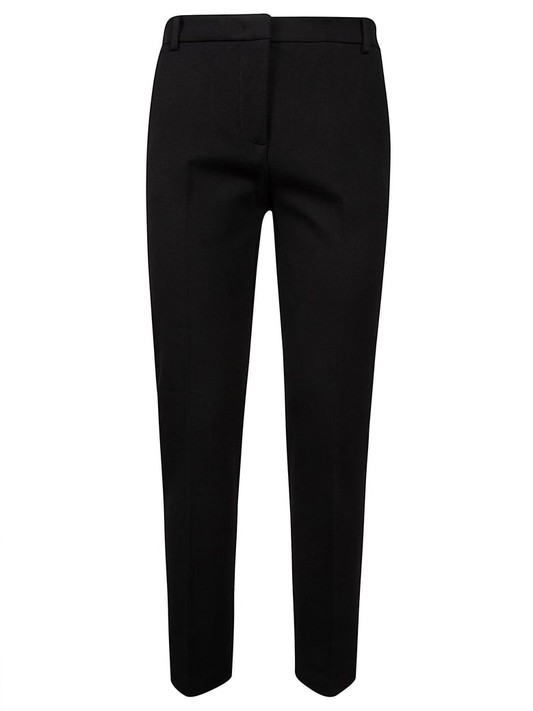 black milano-knit slim trousers by Selfnex