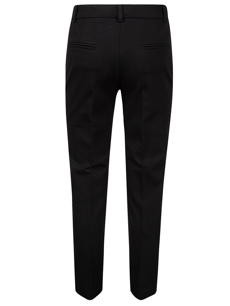 black milano-knit slim trousers by Selfnex
