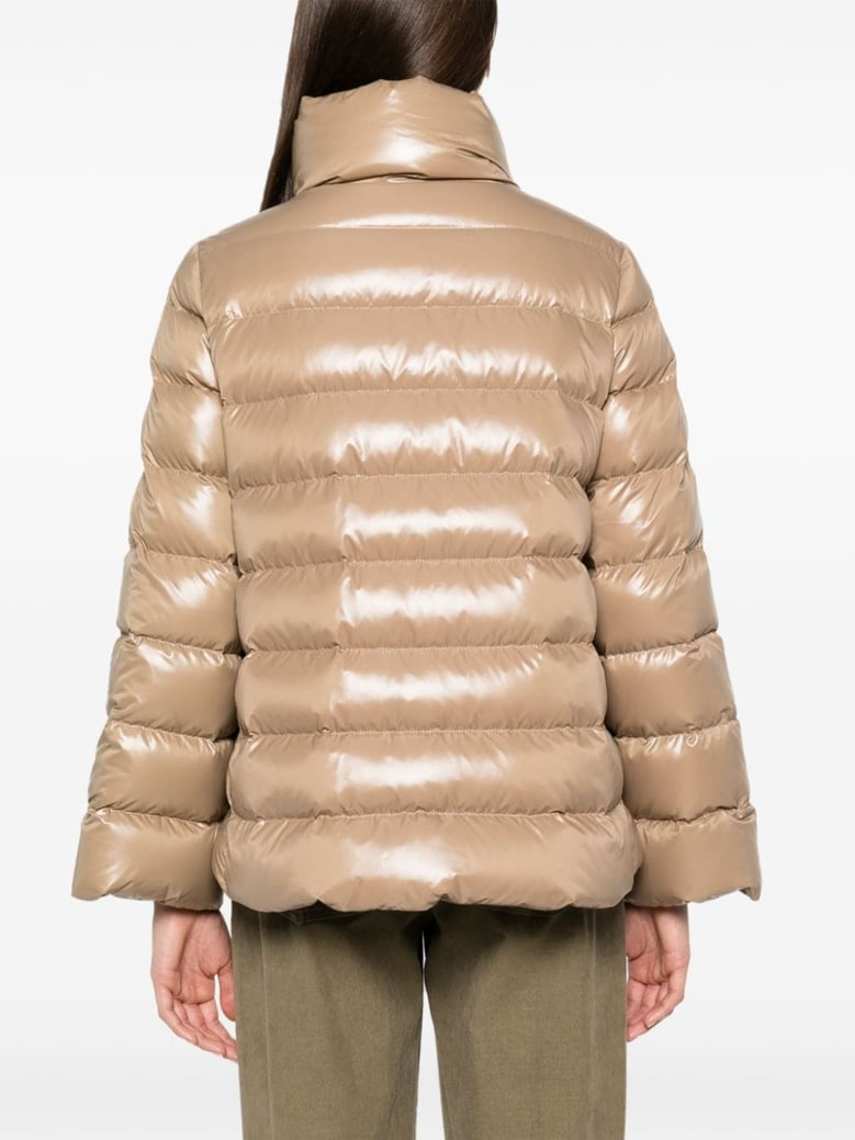 beige glossy quilted down jacket by Selfnex