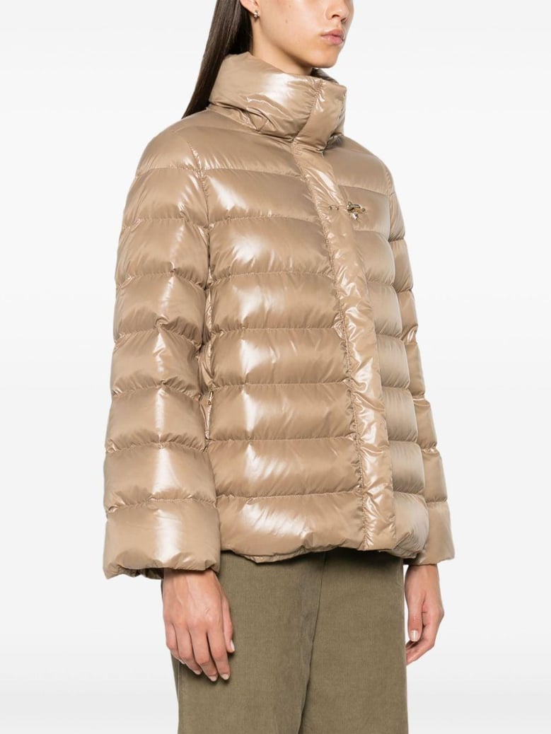 beige glossy quilted down jacket by Selfnex