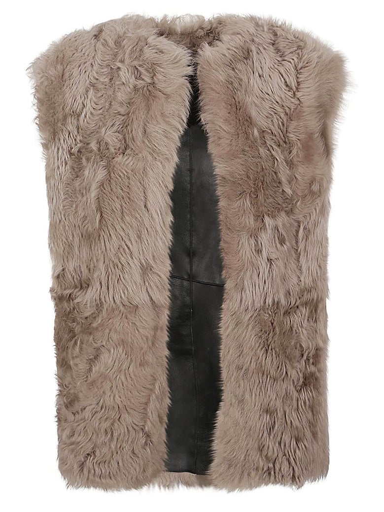 sleeveless fur coat by Selfnex