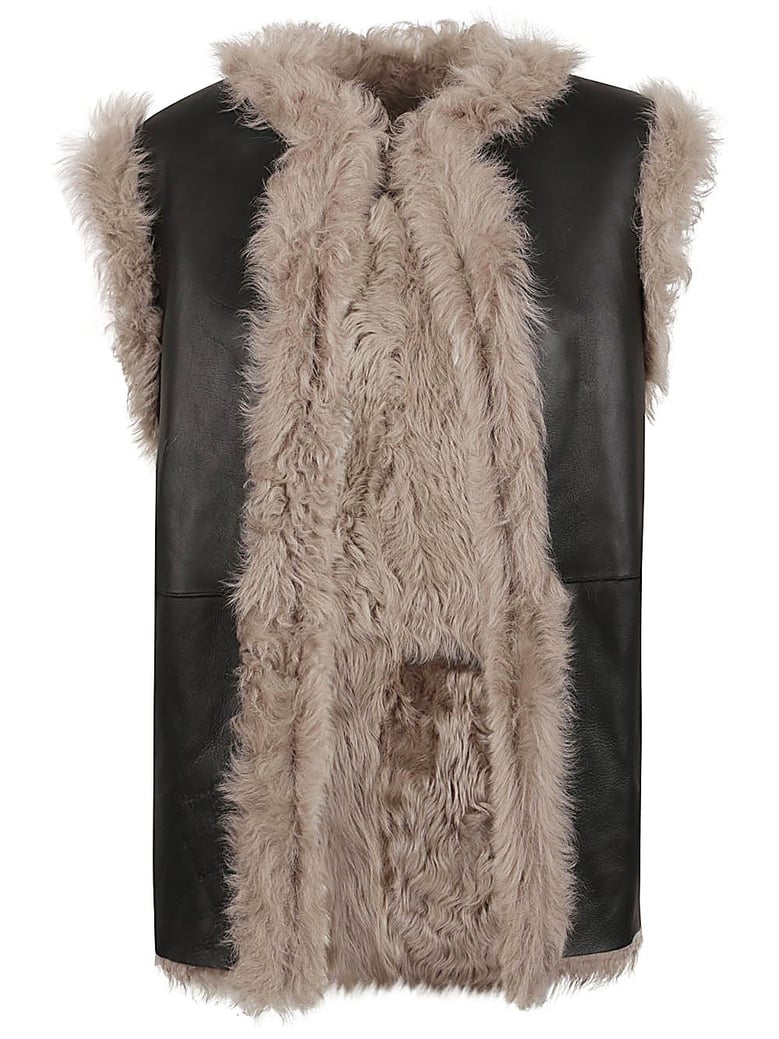 sleeveless fur coat by Selfnex