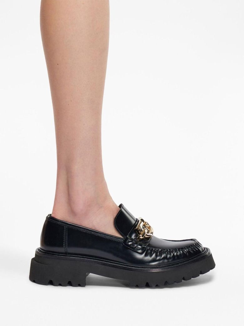 gancini-buckle black leather loafers by Selfnex