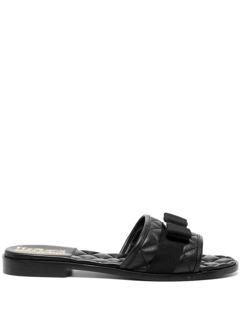 black leather slip-on flats by Selfnex