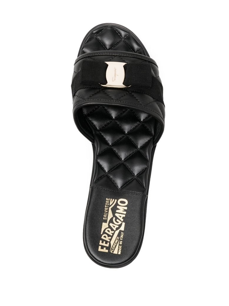 black leather slip-on flats by Selfnex