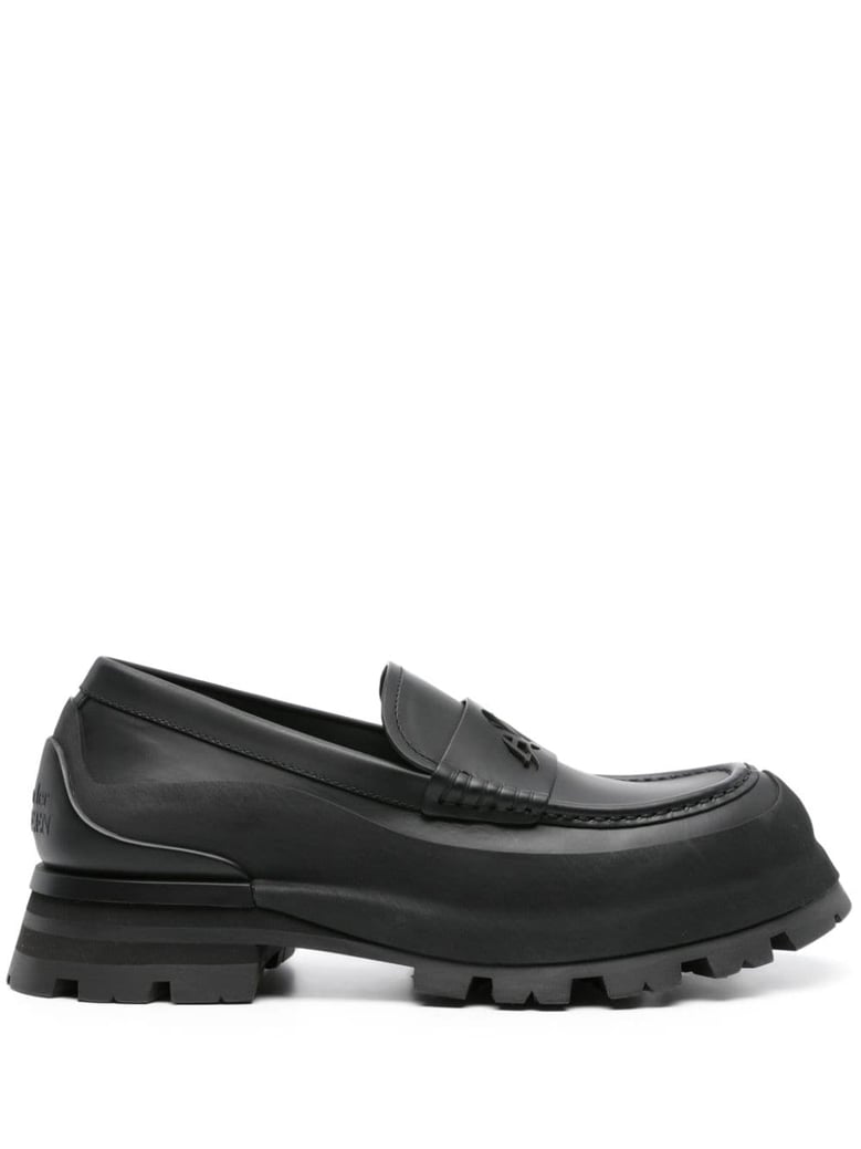 matte black leather slip-ons by Selfnex
