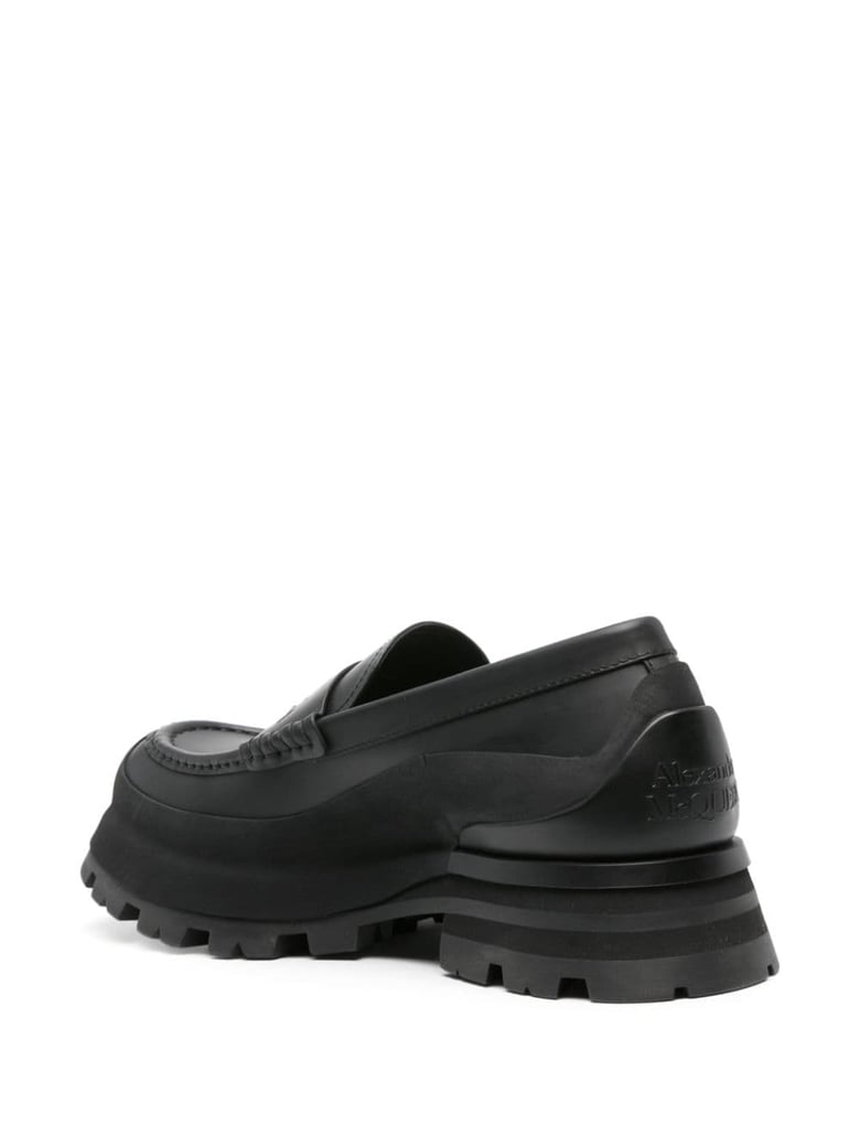 matte black leather slip-ons by Selfnex