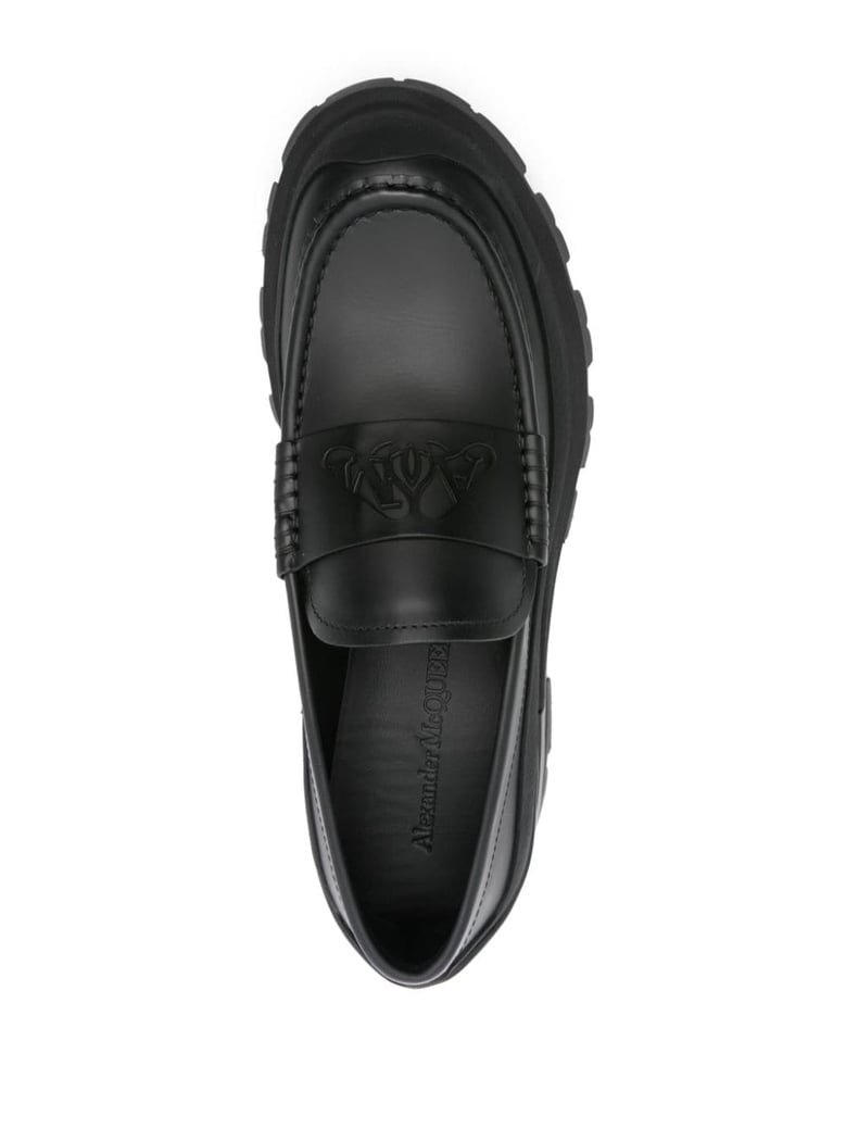 matte black leather slip-ons by Selfnex