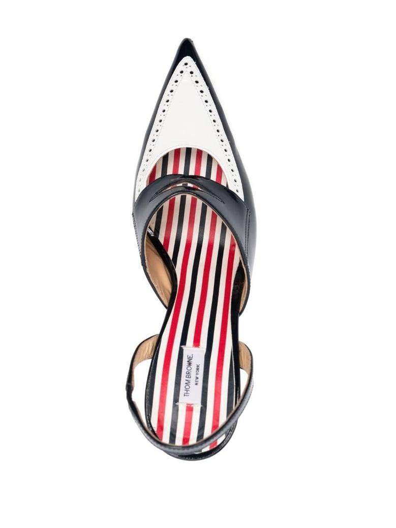curved-heel leather pumps perforated detailing by Selfnex