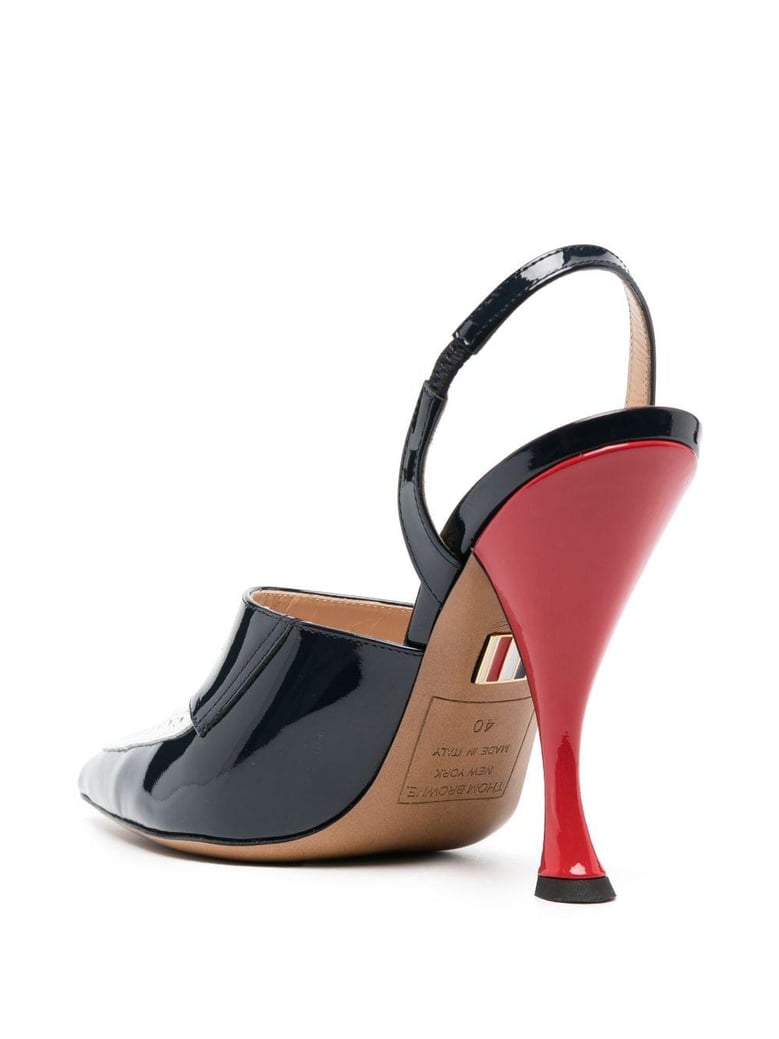 curved-heel leather pumps perforated detailing by Selfnex