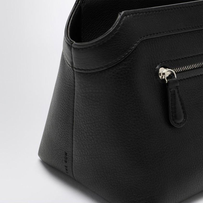 black leather clutch bag by Selfnex