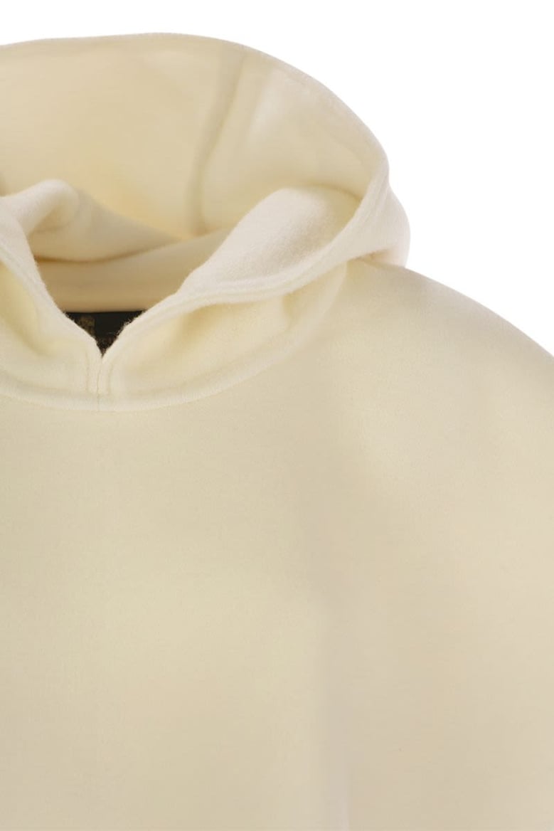 double knit wool and cashmere poncho with hood and fringes by Selfnex